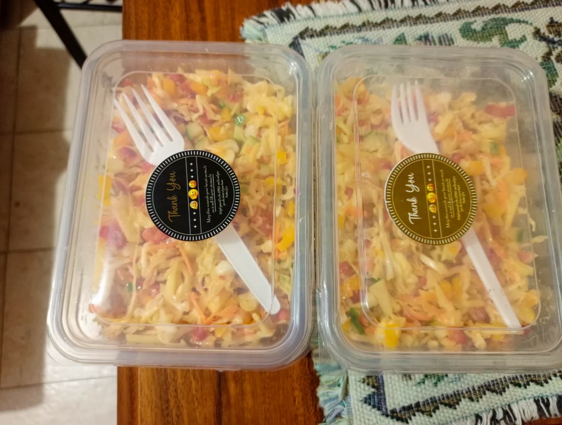 Packed coleslaw salads with thank you tags